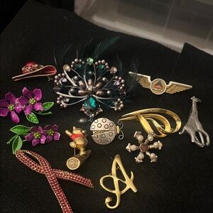 Elegant Gold and Silver Brooch Set